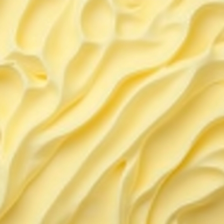 Detalhe da textura suave e rica do buttercream.